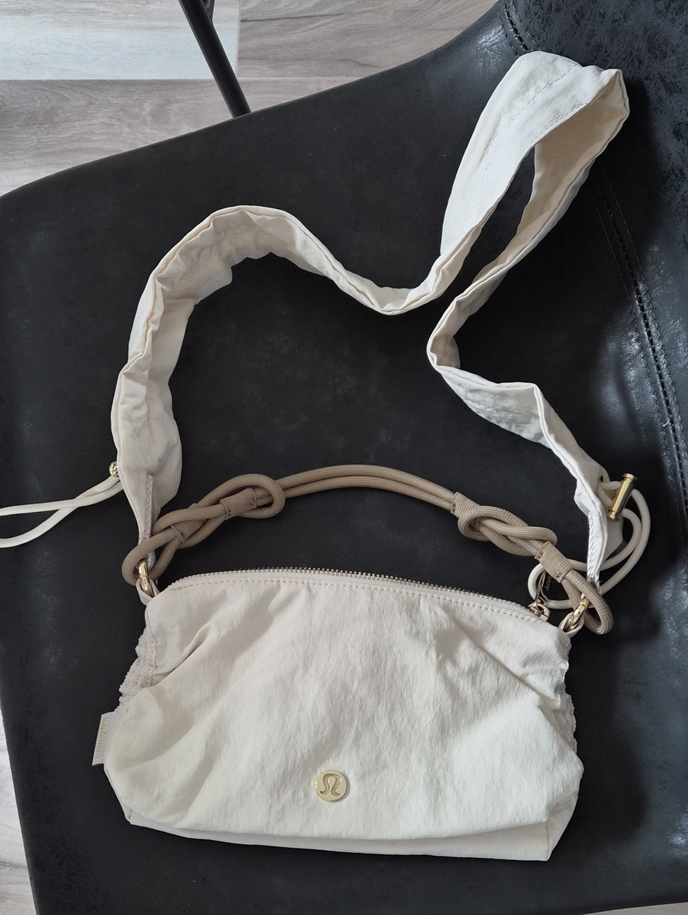 lululemon athletica Cream Crossbody with Knotted Strap and Gold Accents